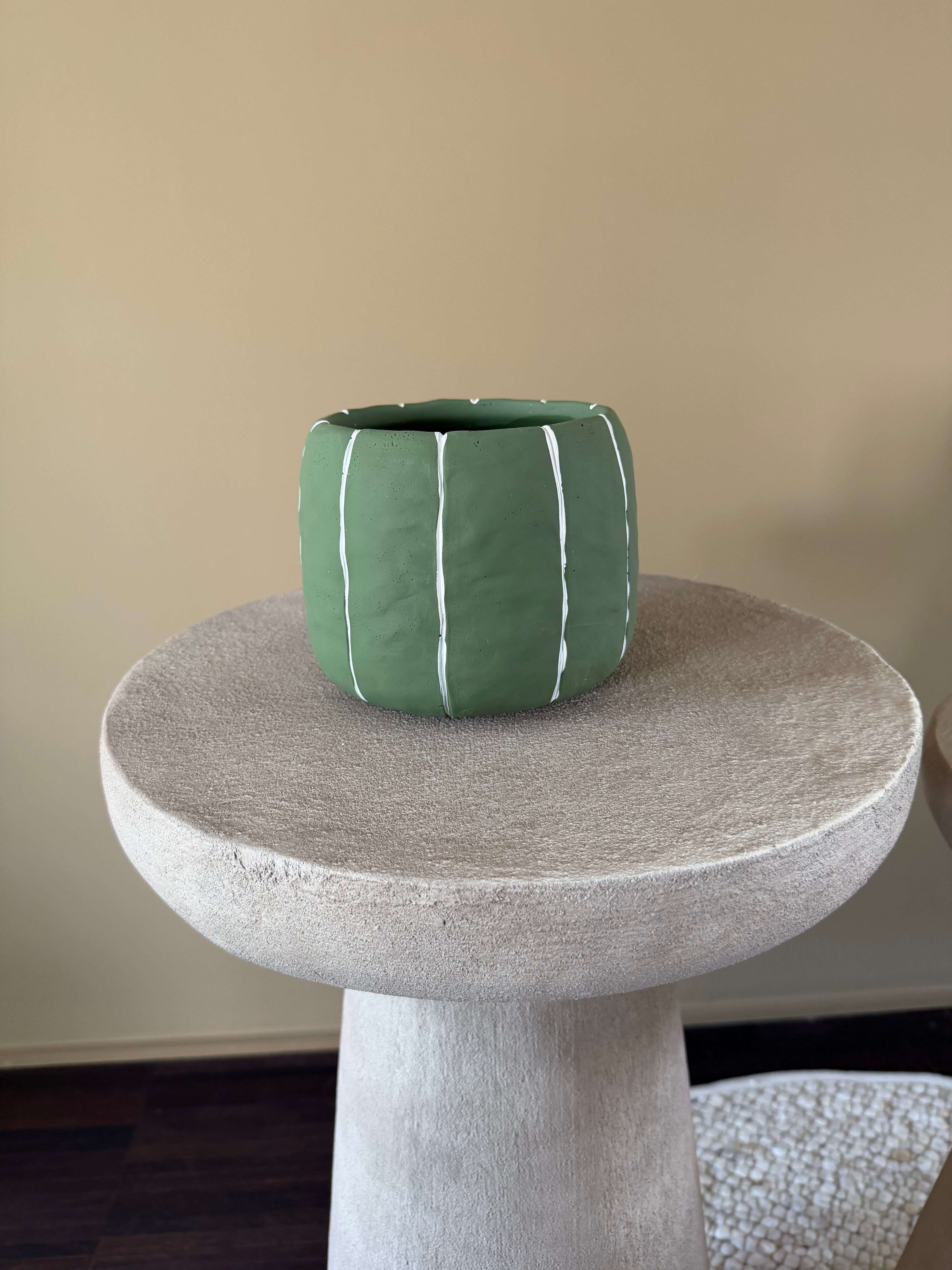 Green striped stone plant pot