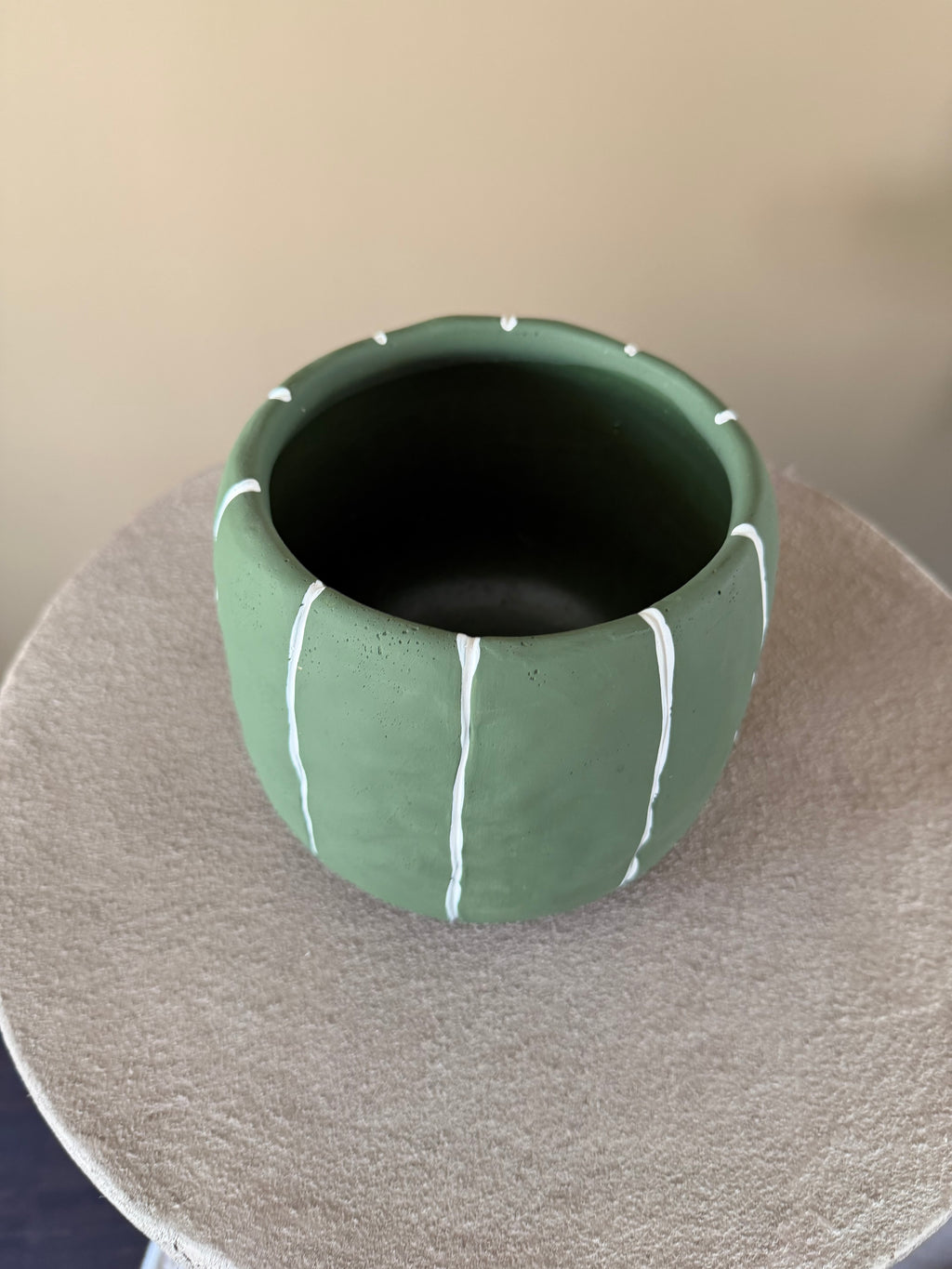 Green striped stone plant pot