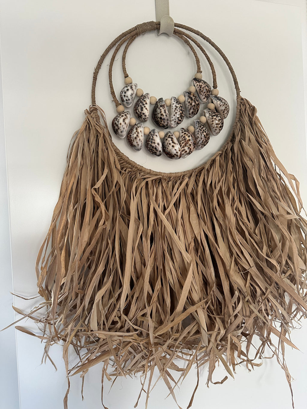 Shell & raffia wall decoration