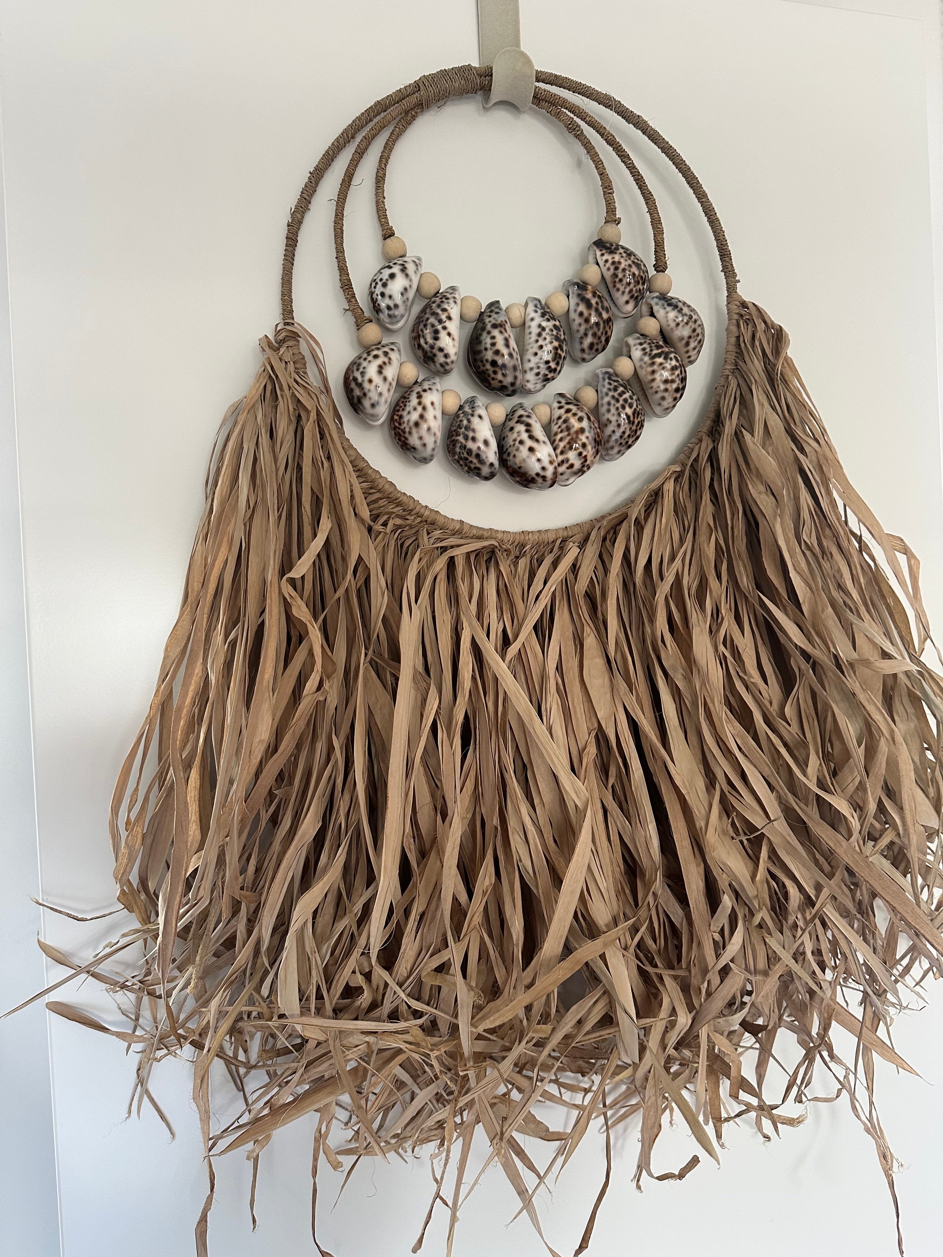 Shell & raffia wall decoration