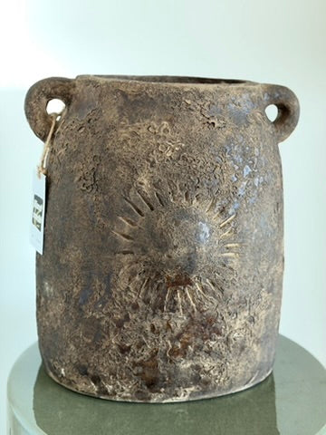 Brown stoneware vase with sun detail and handles