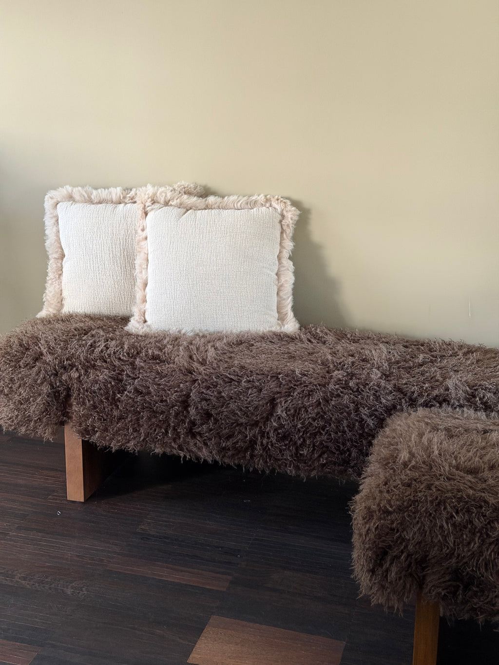 Soft beige cushions lamb curl