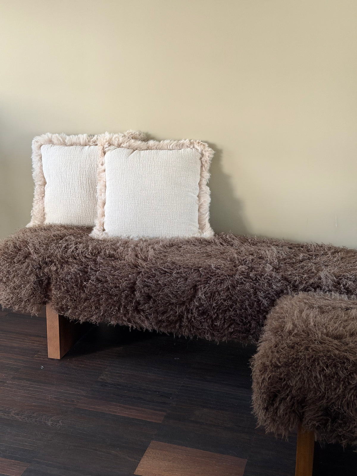 Soft beige cushions lamb curl